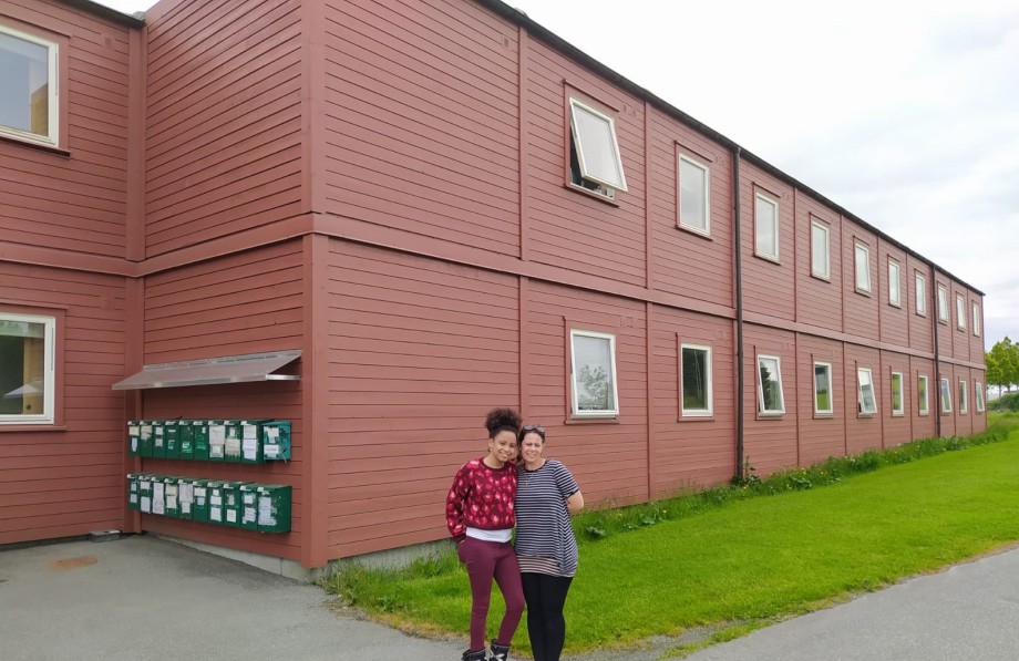 Yansa Terry Araujo and Maydelin Sauto from the University of Havanna, are standing outside the student house Red Box.